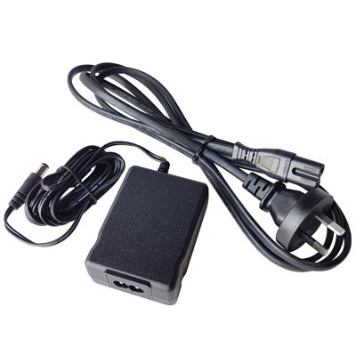 12V 1.5A power adapter with black rectangular body and attached power cords for electronic devices