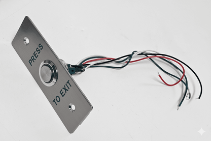 Slim exit button with a polished metal finish and wire connections for secure entry control